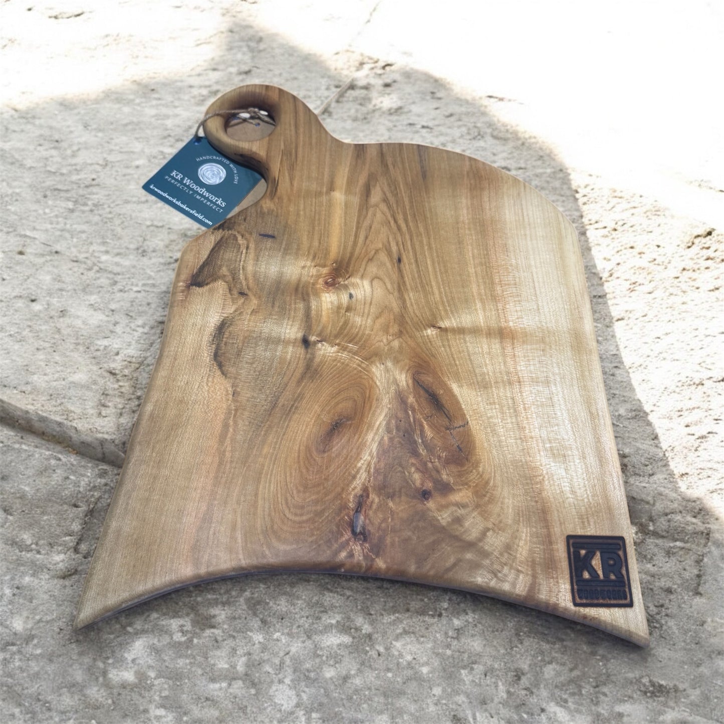 Curved bottom charcuterie with handle